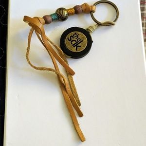 The Sak Charm/Keychain W/Leather Beaded Fringe